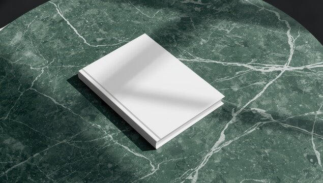 Blank book mockup on green marble coffee table with shadow effect