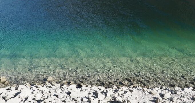 Magnificent turquoise waters of Lake Achen bordering the town of Pertisau in the heart of the Austrian Tyrol
