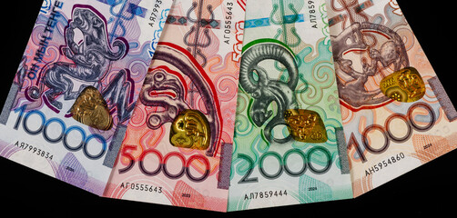 Fototapeta premium Banknotes of 1,000, 2,000, 5,000 and 10,000 Kazakhstani tenge on a black background