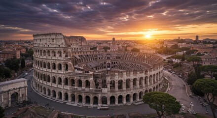 Fototapeta premium Aerial drone view of the ancient Colosseum in Rome, Italy at sunset with cityscape surroundings.