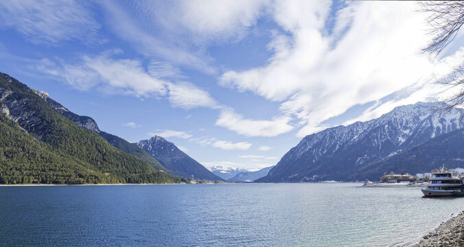 Lake Achern (Achensee) in  Austrian Tyrol. Right, Pertisau port, followed by the slopes of the Zw&ouml;lferkopf and B&auml;renkopf. Left, Klobenjoch and Ebnerjoch. On the horizon, the Zillertal Alps