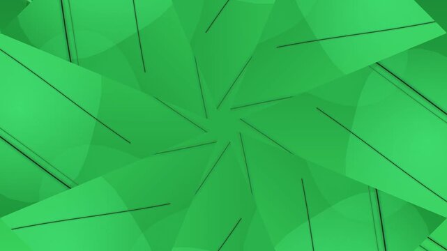 A vibrant green abstract pattern featuring overlapping shapes in various shades, creating a dynamic and eye-catching design