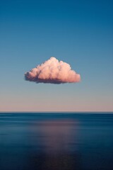 Solitary Cloud Over Calm Waters
