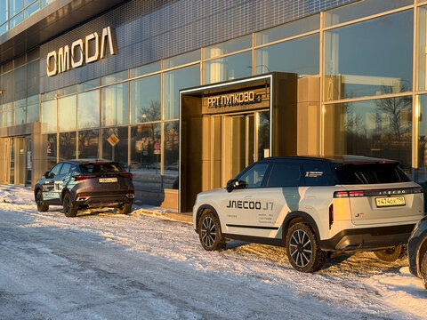 Facade of Omoda car store. Omoda is an automobile manufacturer. Chinese Motor Corporation. Omoda Cars in the showroom. Brand owned by Chery, a Chinese automaker. 