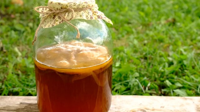 Kombucha in a jar at home. Selective focus.
