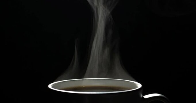 close up of a black coffee cup with thick steam rising against a dark background. generated with AI