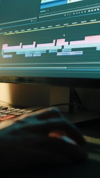 Video editing. Man scrolling through a timeline in Premiere Pro