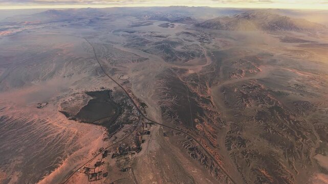 Side aerial shot at sunset of Gayal Desert and Neom. Saudi Arabia