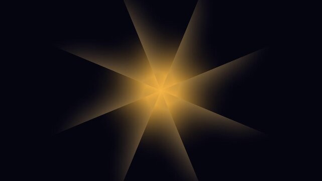 A bright yellow starburst shines on a black background