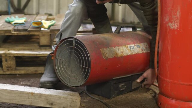 Igniting gas fueled space heater in workshop