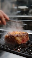 The chef hand-cooks the steak and adds seasonings using a freezing technique.