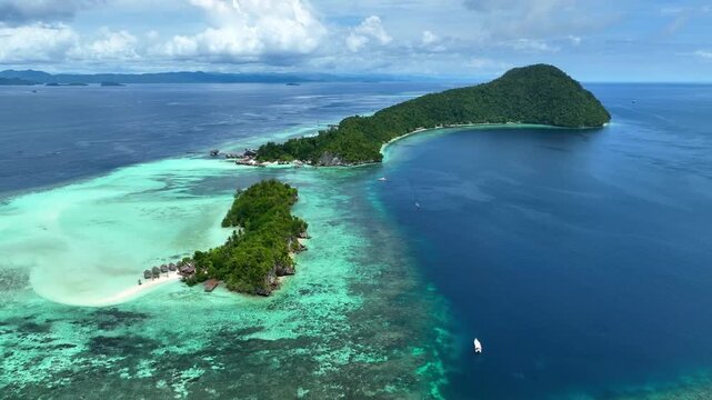 Aerial Top View of a Tropical Island Paradise at Raja Ampat Islands, Indonesian archipelago, West Papua, Indonesia	