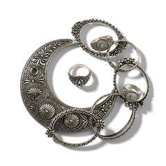 Intricate Antique Silver Jewelry Set Ornament Rings White Background