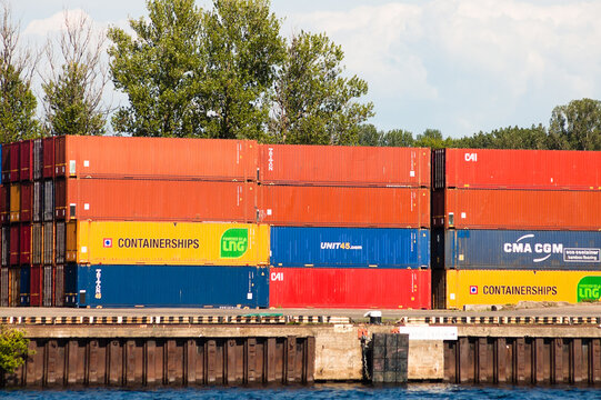 Riga, Latvia - June 28, 2023: cargo containers in the port close-up against the blue sky