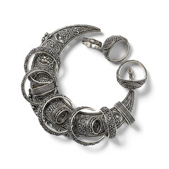 Ornate Sterling Silver Jewelry Artistically Arranged on White Background