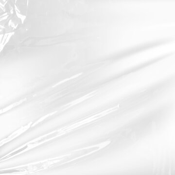 Transparent plastic wrap texture with soft highlights and realistic wrinkles