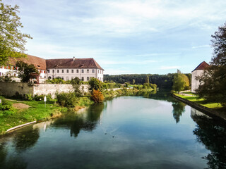 Rhine Abbey stands on an island in the Rhine River in Rheinau Switzerland