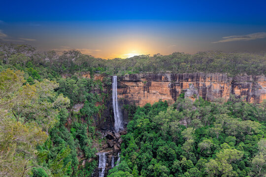 Beautiful flowing River in Fitzroy water Falls in Bowral NSW Australia beautiful colourful cloudy skies lovely waterfalls
