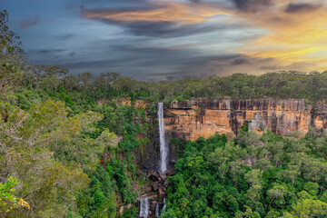 Beautiful flowing River in Fitzroy water Falls in Bowral NSW Australia beautiful colourful cloudy skies lovely waterfalls
