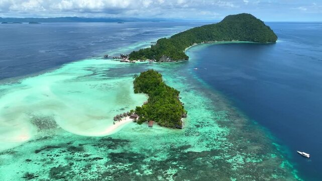 Aerial  View of a Tropical Island Paradise at Raja Ampat Islands, Indonesian archipelago, West Papua, Indonesia
