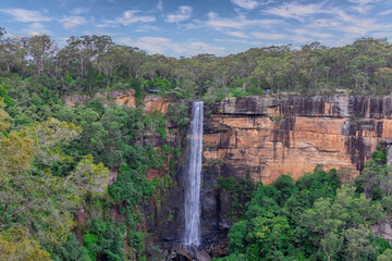 Beautiful flowing River in Fitzroy water Falls in Bowral NSW Australia beautiful colourful cloudy skies lovely waterfalls