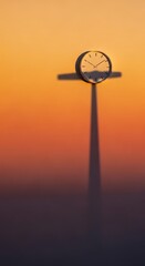 Minimalist wall clock silhouette at sunset with warm orange glow and time concept