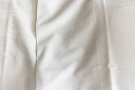 White fabric texture. Soft background.