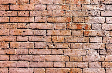 Obraz premium Old weathered red brick wall as creative background