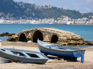 Two wooden rowing boats lie on the shore at Argassi, Zaskynthos, Greece © Stephen