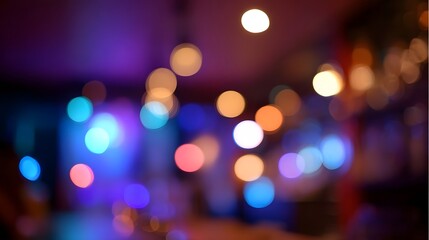 Vibrant bokeh lights in a spectrum of colors create a festive abstract atmosphere ideal for celebrating or nightlife themes
