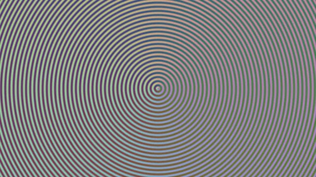 Gray background with a colorful concentric circle optical illusion pattern