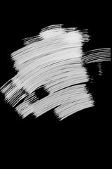 Light brushstrokes against a dark background.