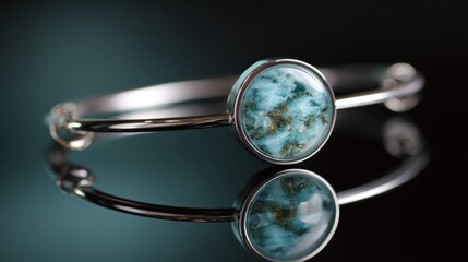 silver bangle bracelet with blue marbled stone