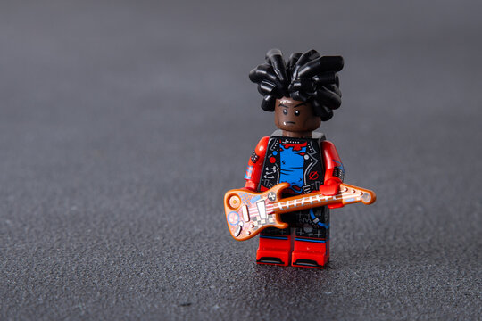 LEGO Hobie Brown Spider-Punk collectible minifigure from the Spider-Man Across the Spider-Verse series. Toy man on black background. Kyiv, Ukraine - January 8, 2026