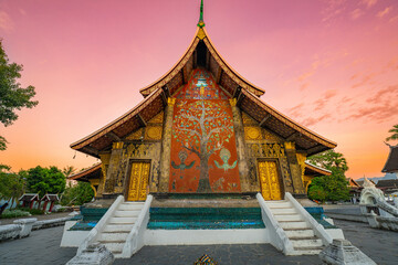 Wat Xieng Thong is one of the most revered and historic temples in Luang Prabang, Laos. Celebrated...