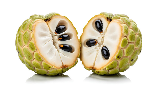 Custard apple cherimoya fruit cut in half showing creamy white flesh and black seeds isolated on white background studio shot exotic tropical healthy
