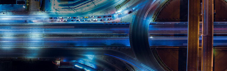 Night traffic scene illustrating digital economy and future mobility concepts. © Hand Robot