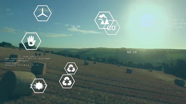 Animation of eco icons and data processing over countryside farm land