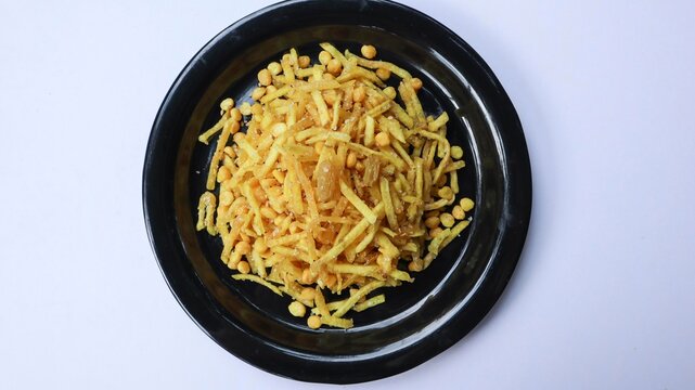 Top view of Vrat ka khana, Upawas snacks Farali chevdo, or faradi sev made of deep fried potato, raisins and sago pearls