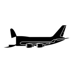 Silhouette of a large cargo airplane in flight.