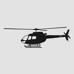 Silhouette of a modern helicopter in flight.
