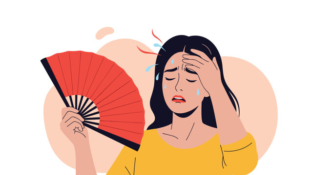 Distressed young woman cooling herself with a red hand fan while sweating during an intense summer heat wave outdoors.