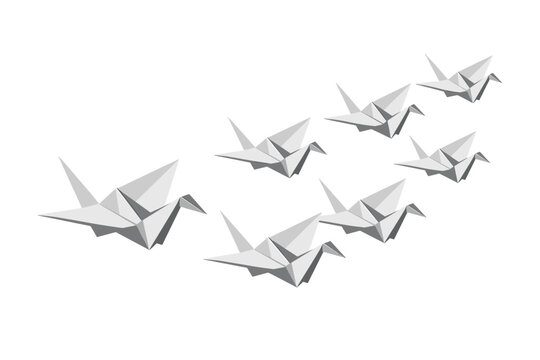 Origami paper cranes flying in formation, symbol of peace