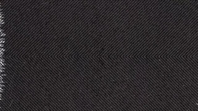 Dark Herringbone Fabric Texture with Frayed Edge black