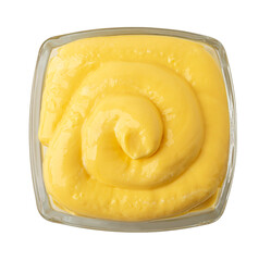 Swirling yellow mustard sauce in glass bowl