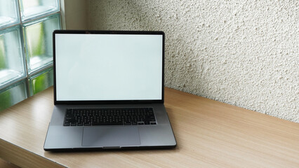 Modern Space Gray MacBook Pro Mockup on Minimalist Wooden Desk with Blank Screen