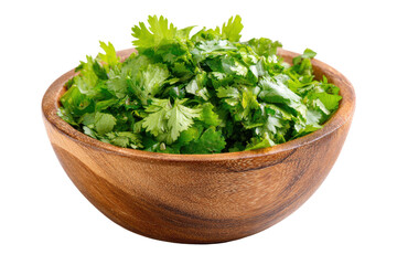 Fototapeta premium Fresh chopped cilantro in a wooden bowl isolated on transparent background. Chopped fresh cilantro in a wooden bowl for cooking isolated on white background.