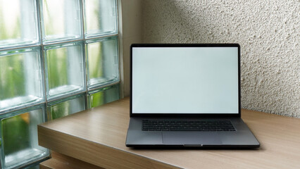 Modern Space Gray MacBook Pro Mockup on Minimalist Wooden Desk with Blank Screen