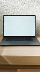 Modern Space Gray MacBook Pro Mockup on Minimalist Wooden Desk with Blank Screen