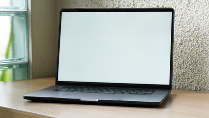 Modern Space Gray MacBook Pro Mockup on Minimalist Wooden Desk with Blank Screen